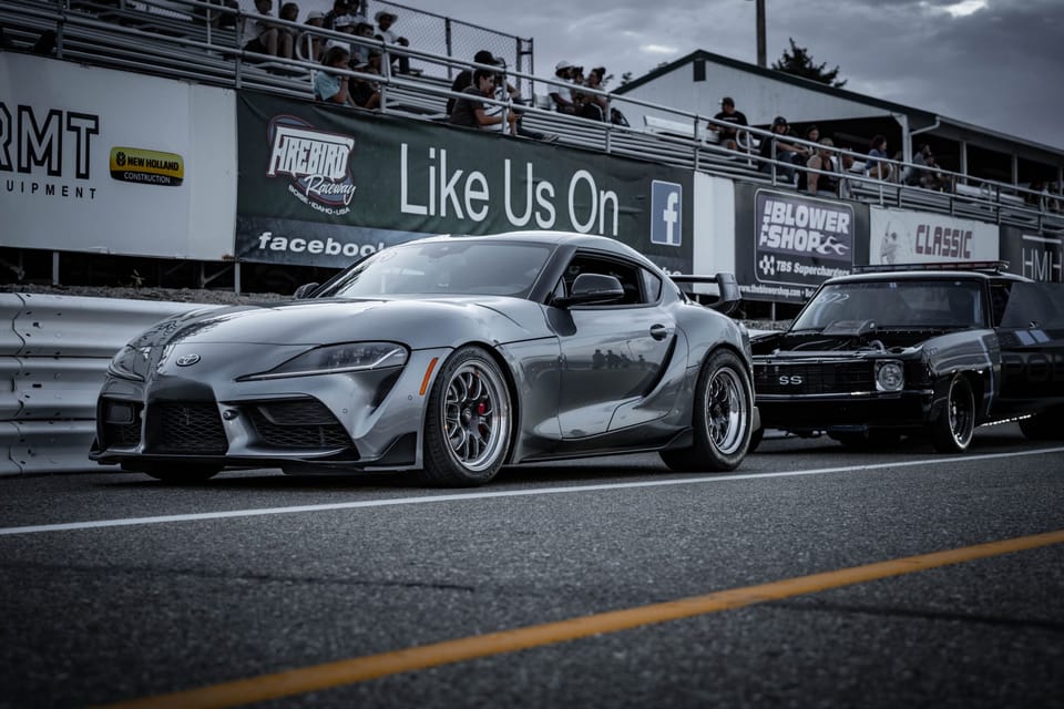 Gray Toyota Supra at a drag strip