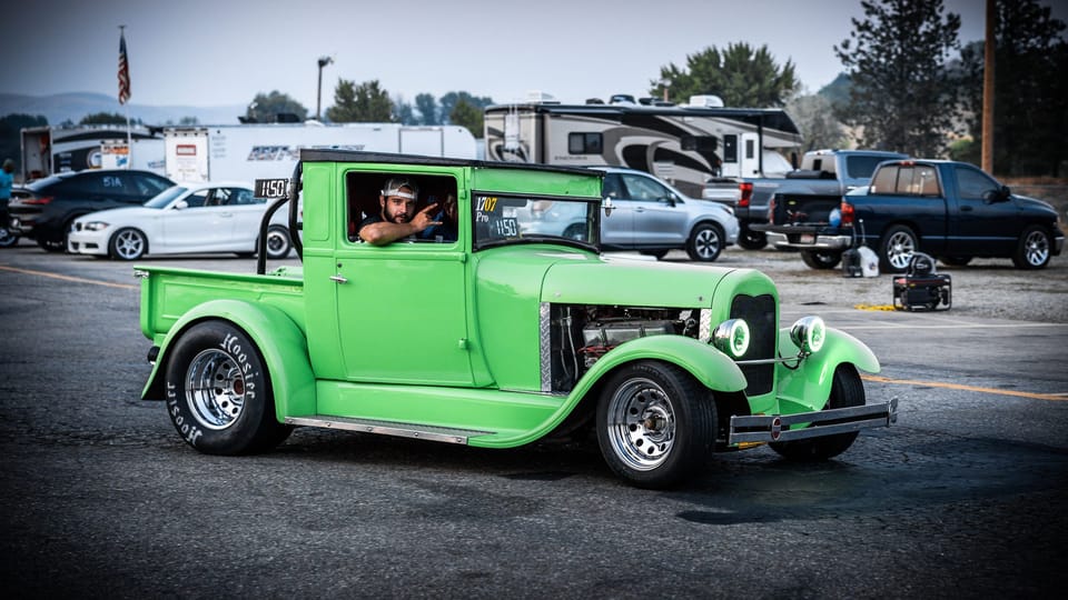 Bright green vintage hot rod at a car show