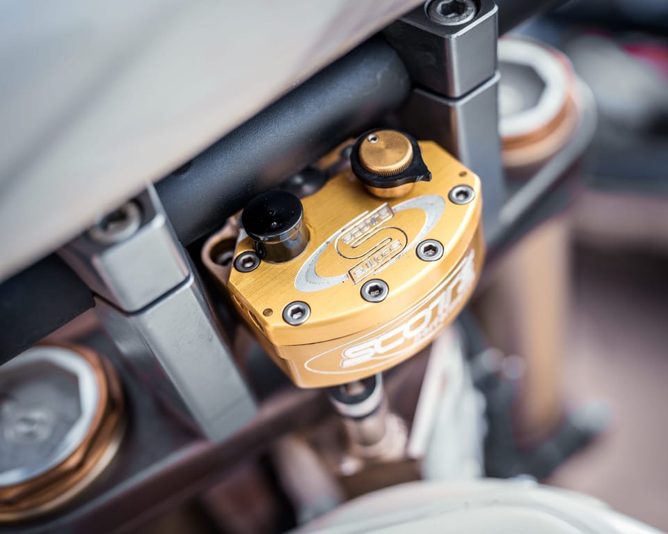 Gold motorcycle shock absorber detail