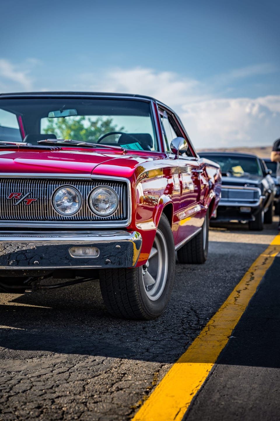 Red classic car at a drag strip car show