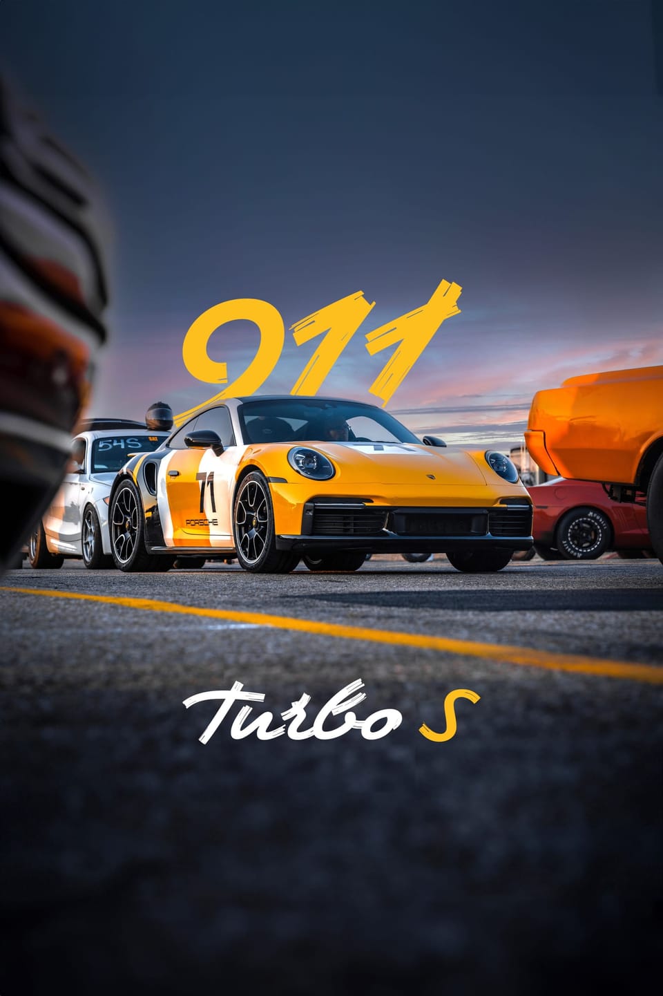 Yellow Porsche 911 Turbo S at sunset with graphic lettering